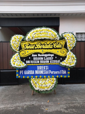 Papan Bunga Duka di Wera